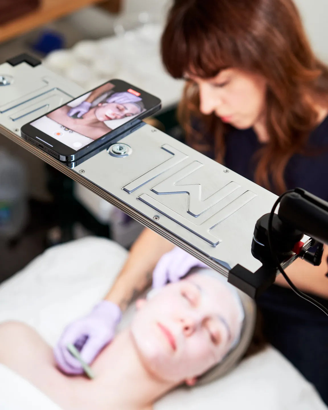 Eyelight in a spa mounted on a stand with universal arm for facial and brow work