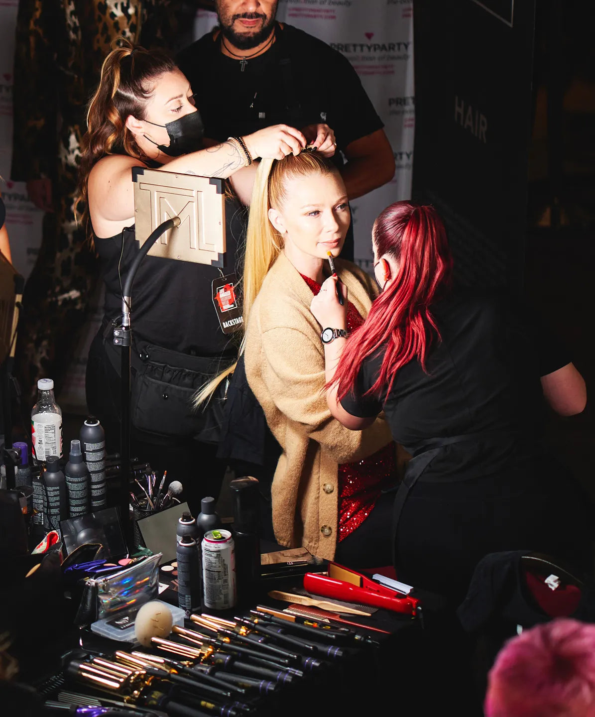 Backstage action with a Key Light provides light and space for multiple artists