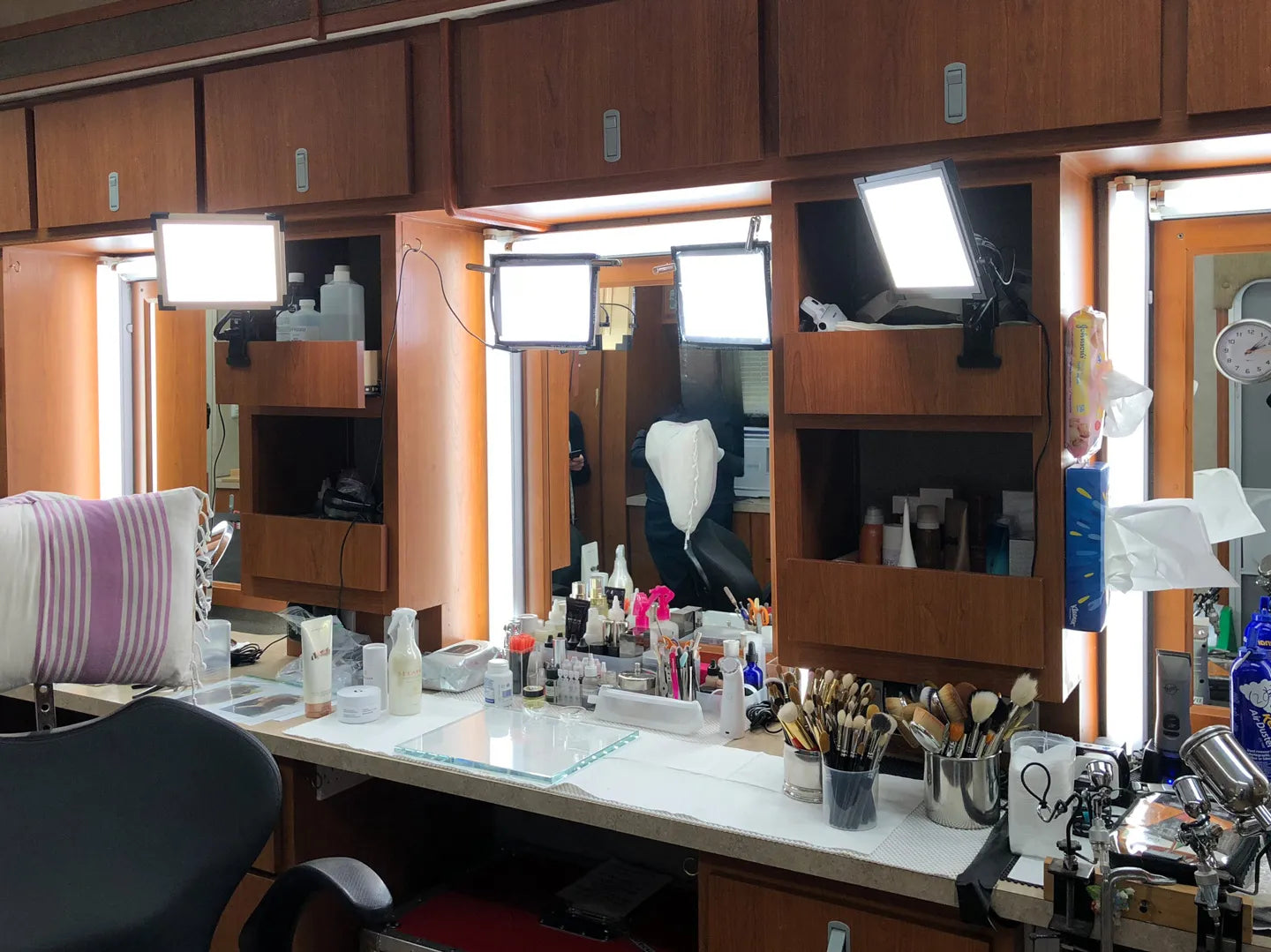 Four Key Lights, two mounted with Suction Mounts and two with EZ Clamps in a makeup trailer