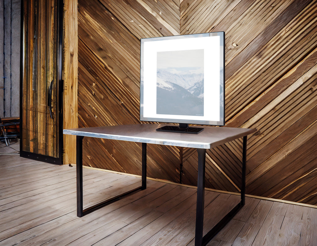 A TML Meira LUXe vanity sits atop a brown table with black legs over a wood floor