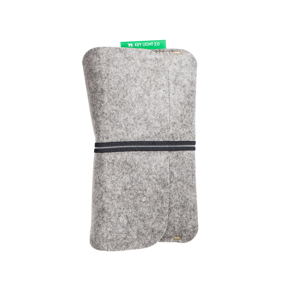A small gray felt pouch